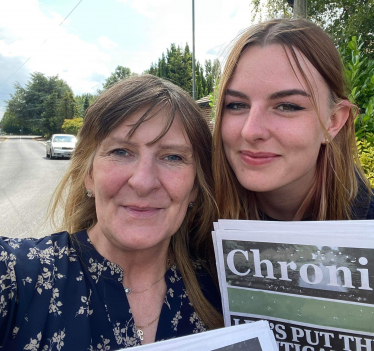 Rachel Storer with a female campaigner on International Women's Day